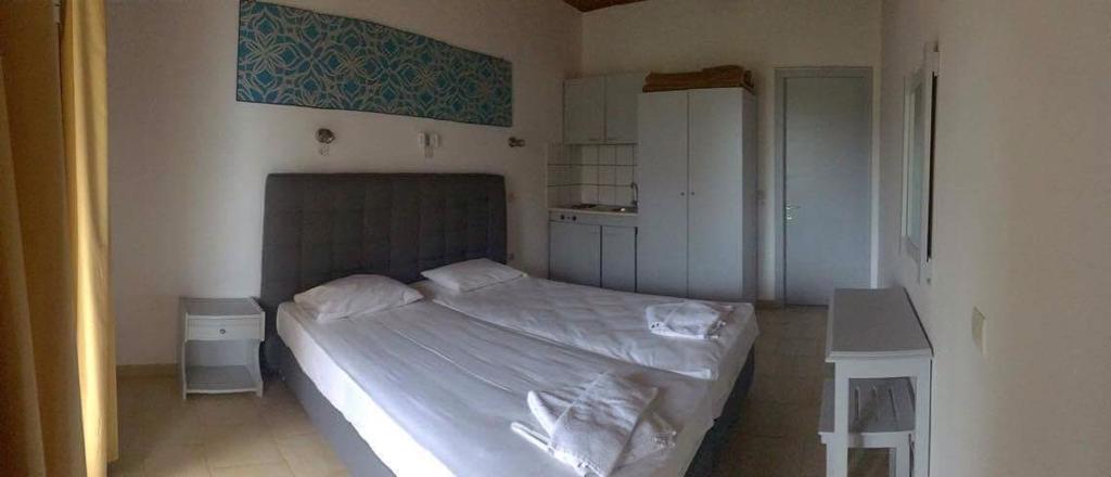 Athina Aparthotel Kávos Buitenkant foto