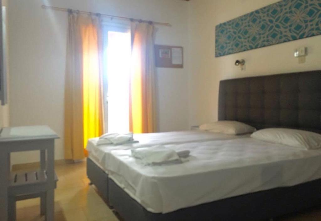 Athina Aparthotel Kávos Buitenkant foto