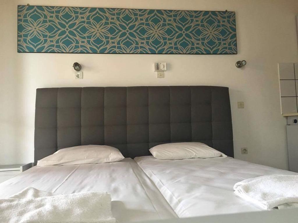 Athina Aparthotel Kávos Buitenkant foto